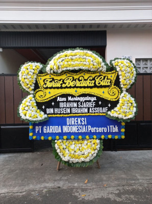 Papan Bunga Duka di Ranto Baek