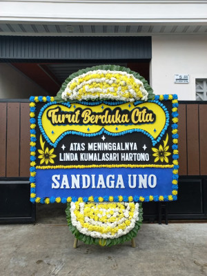 Papan Bunga Duka di Ranto Baek